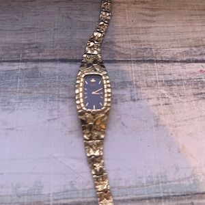 Woman’s Seiko gold 117E watch